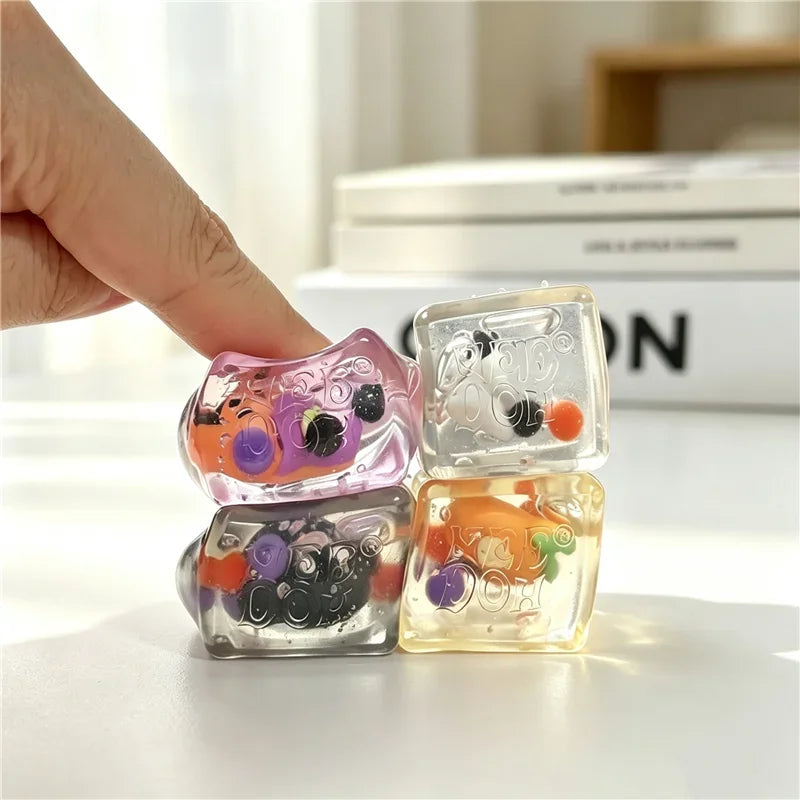 Schylling NeeDoh Halloween Mini Ice Cube 4-Pack - Slow Rise Squishy Fidget Sensory Toy - Anxiety Relief Squeeze Ball