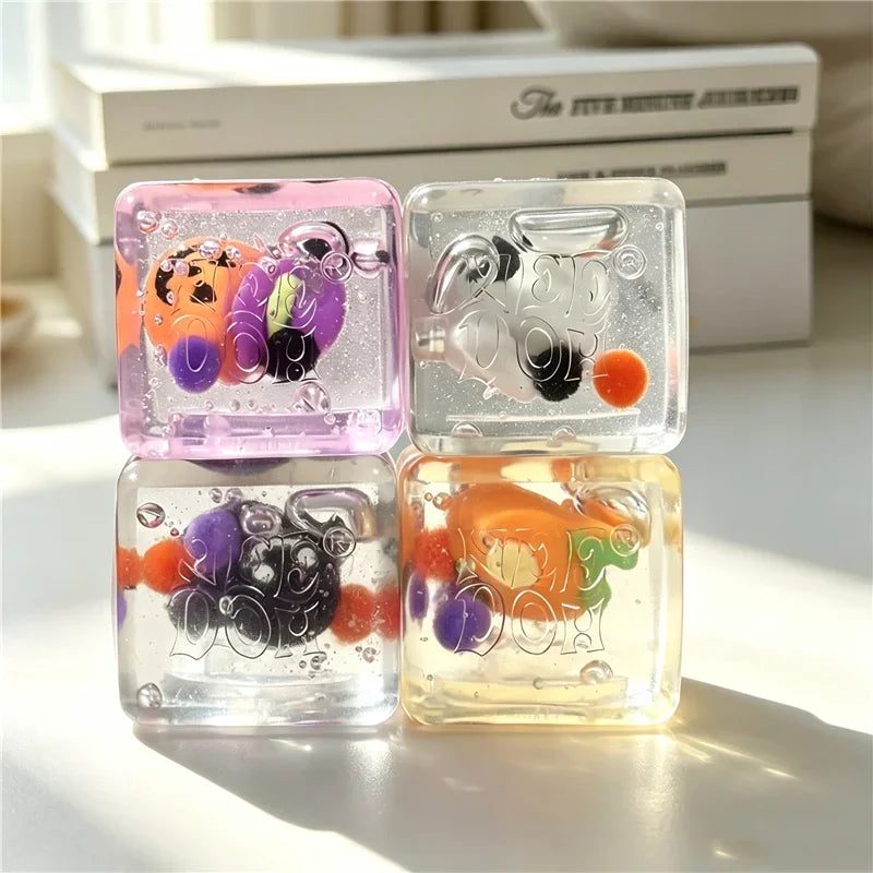 Schylling NeeDoh Halloween Mini Ice Cube 4-Pack - Slow Rise Squishy Fidget Sensory Toy - Anxiety Relief Squeeze Ball