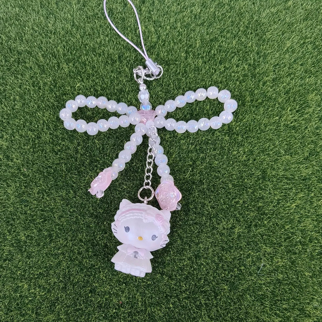 Sanrio Pearl Bow Bonnet Keychain – Hello Kitty & Cinnamoroll Mystery Blind Box Pendant